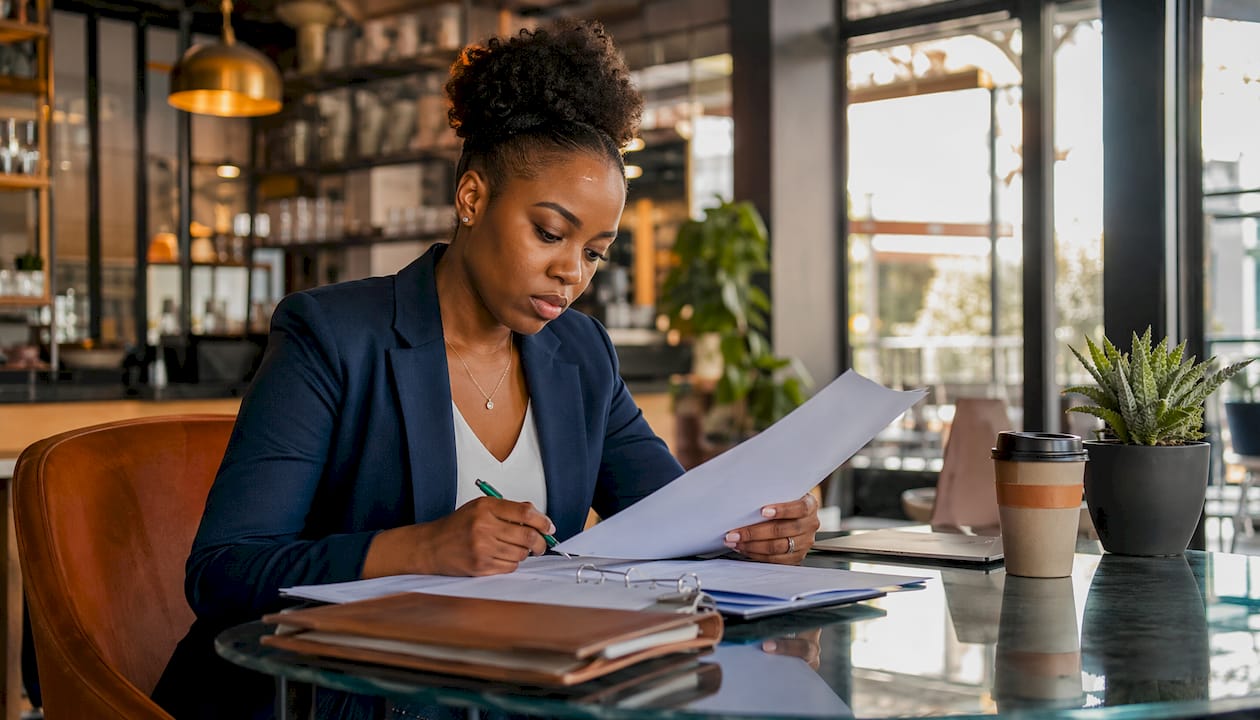 HR manager reviewing payroll documents