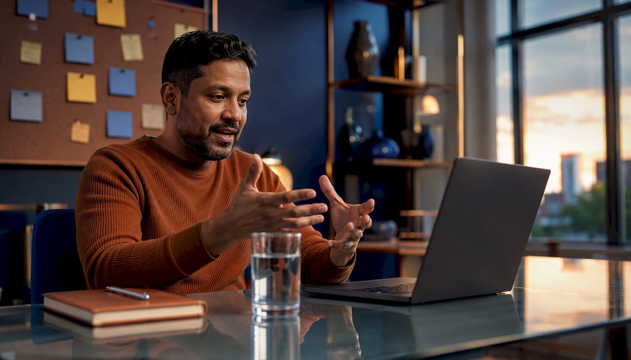 Man on video call discussing entity ownership